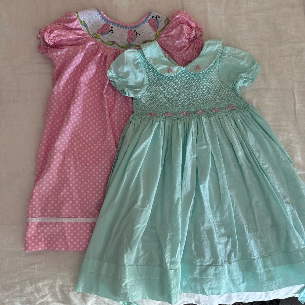 2 girls smocked dresses. Selling both together.